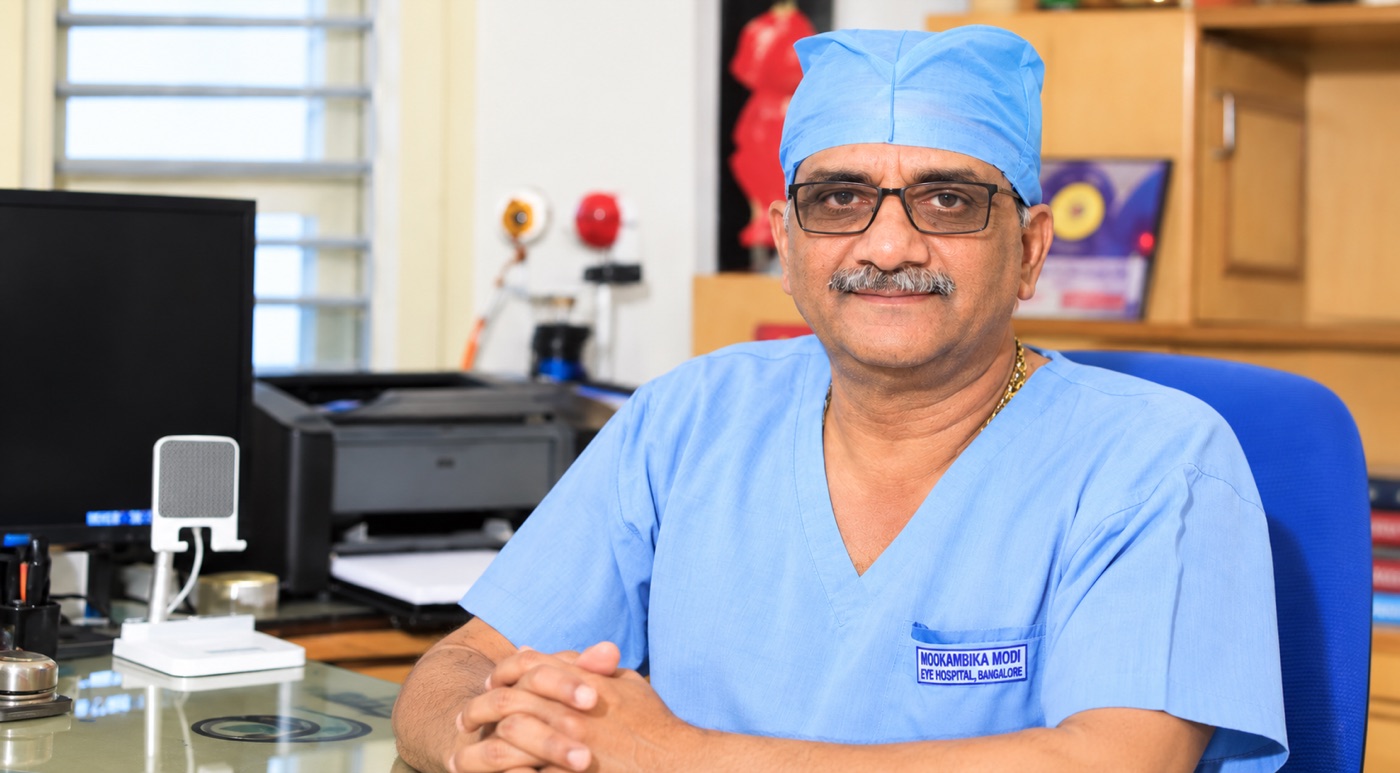 Senior eye surgeon in consultation at Mookambika Modi Eye Hospital Tumkur