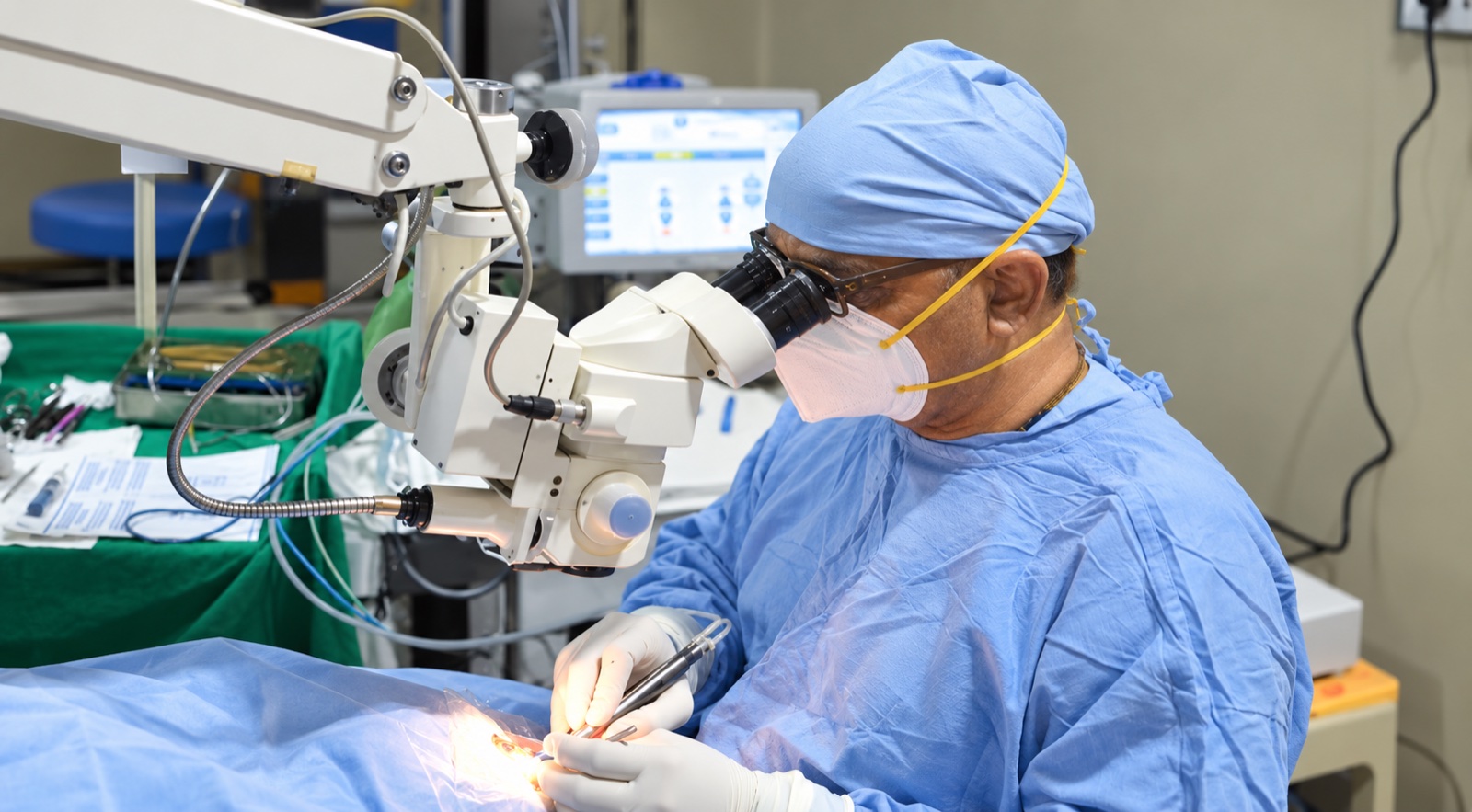 Eye surgeon performing microsurgery at Mookambika Modi Eye Hospital Tumkur